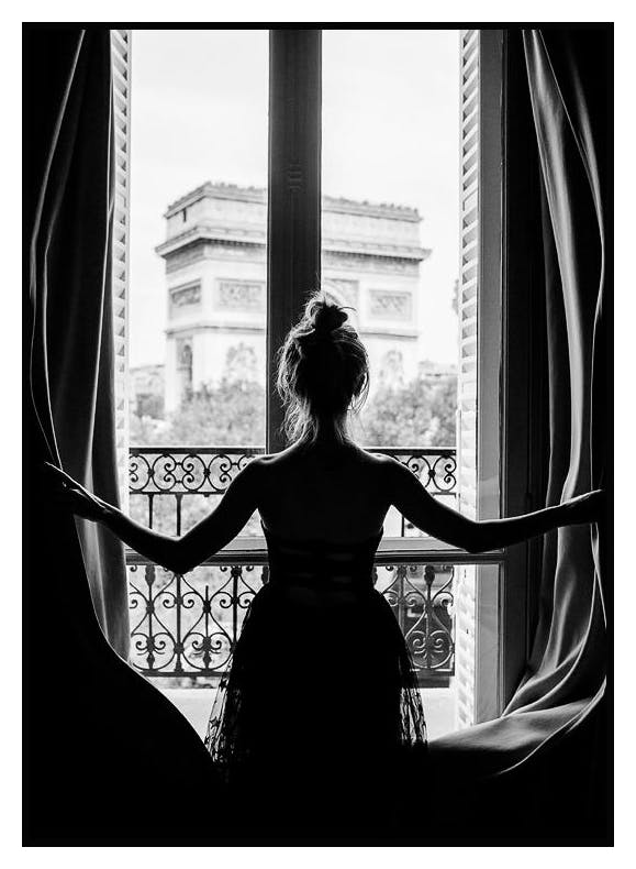 Girl in Paris Window. Poster (70x100 cm) - Poster Store