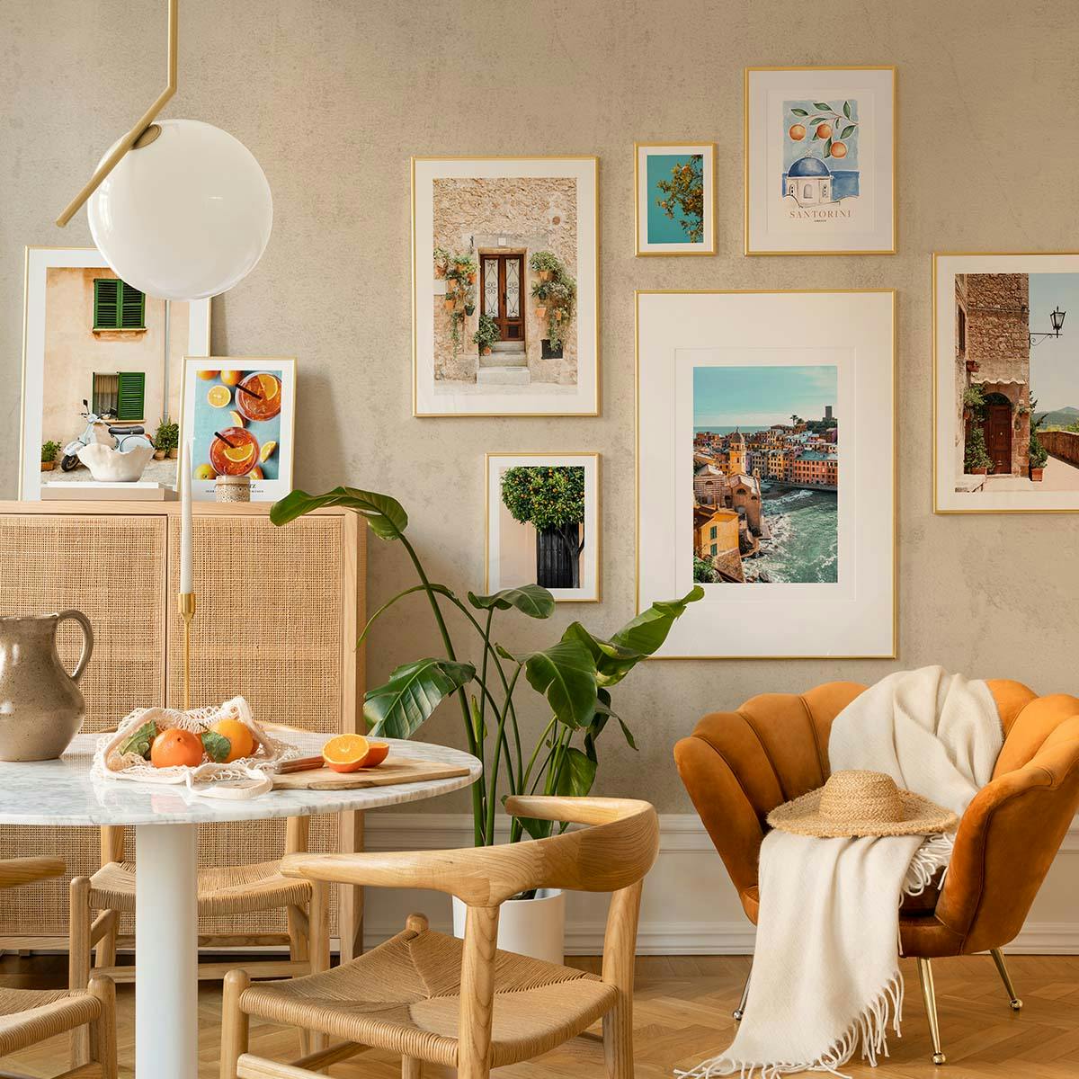 Adventurous gallery wall in happy colours of different places in the world for the dining room or living room