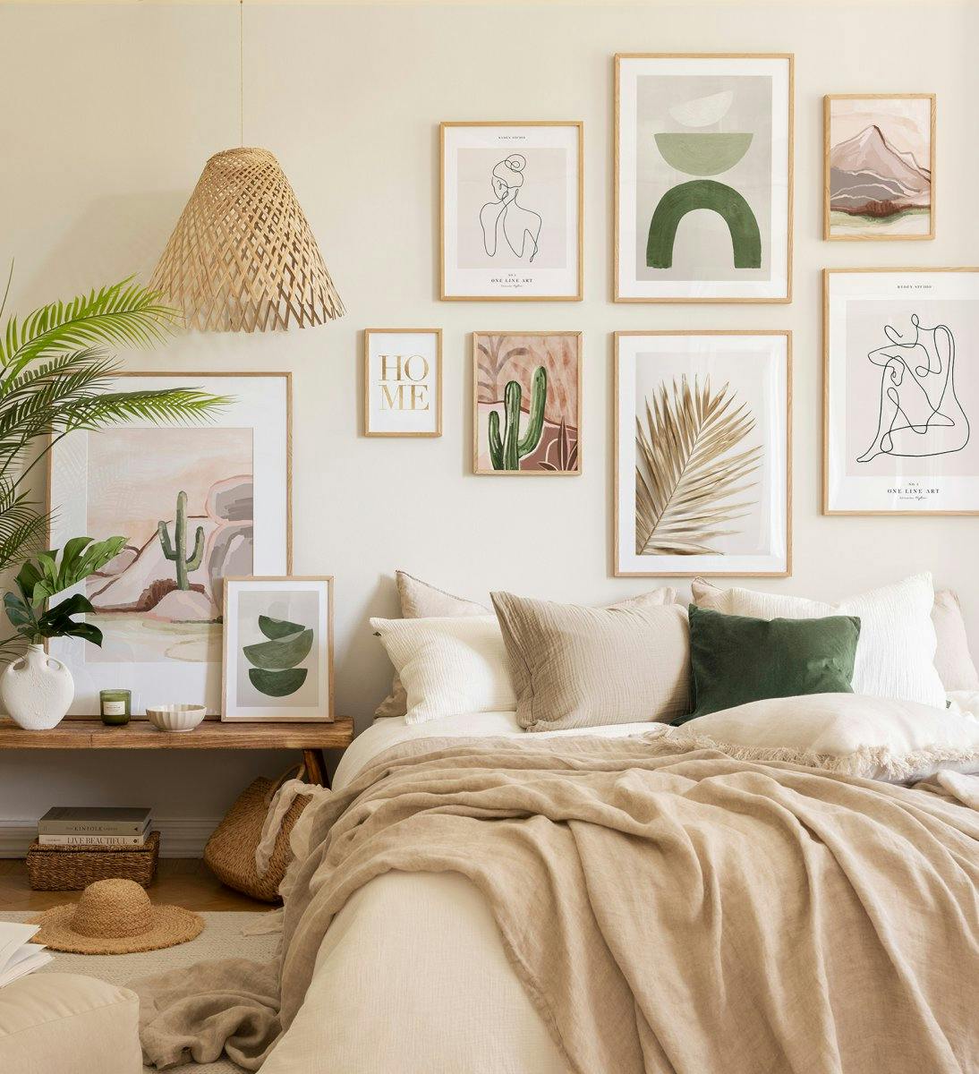 Oak-framed gallery wall featuring calm, summerly colors for the bedroom.