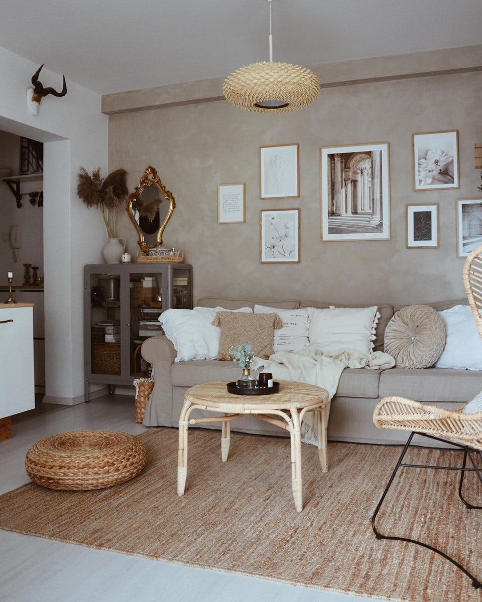 Stylish beige living room posters gallery wall oak frames