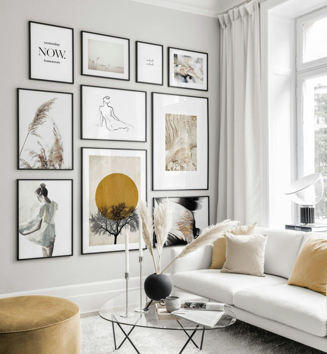 Earthy gallery wall with designposters and black frames