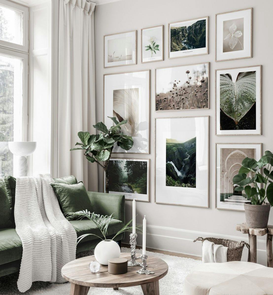 Soothing gallery wall in brown green tones with nature posters in oaken frames