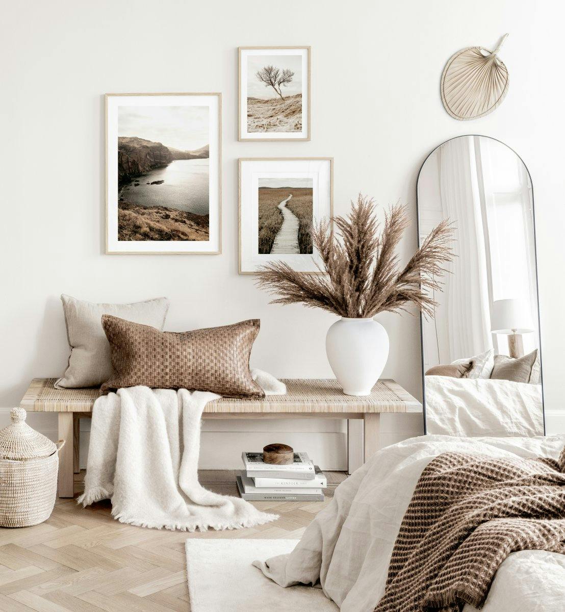 Trendy bedroom gallery wall beige white nature posters oaken frames