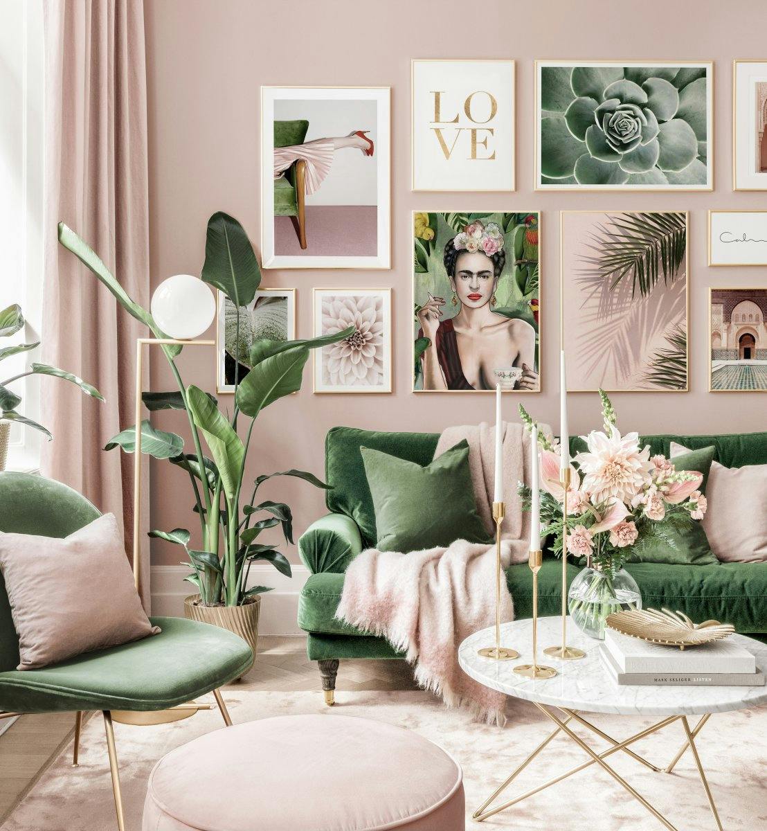Stylish gallery wall pink green living room Frida poster golden frames