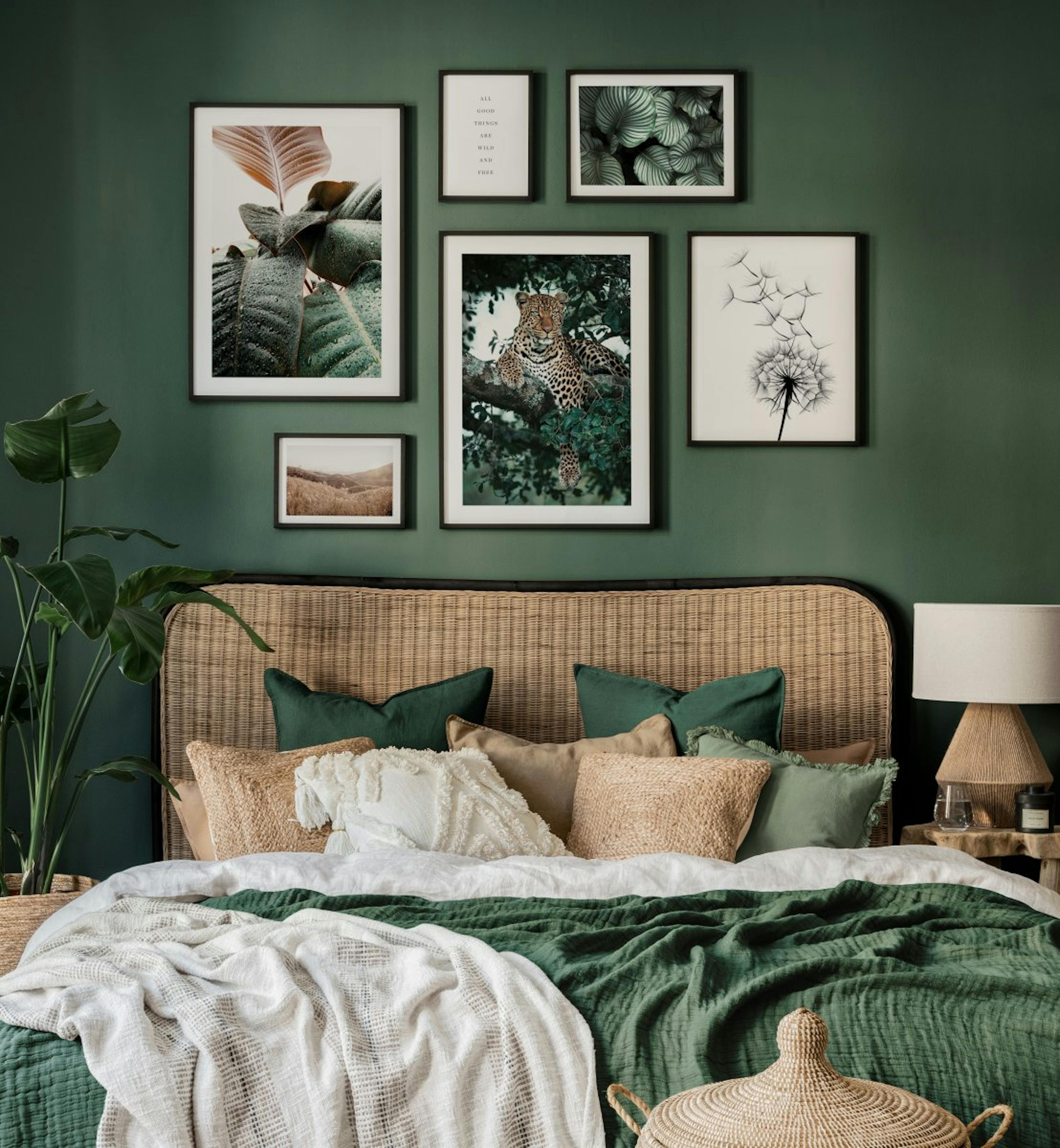 Animal posters and dark green botanical prints in bedroom