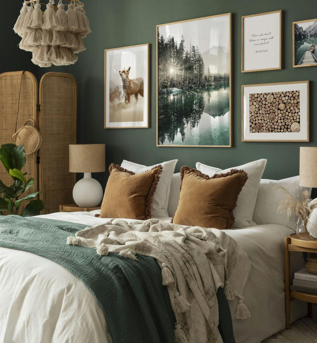 Dark nature posters and animal prints in trendy bohemic bedroom