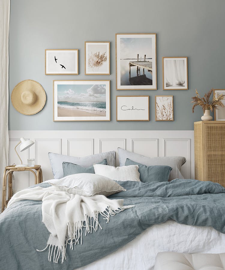 Nature gallery wall in blue with oak frames for bedroom