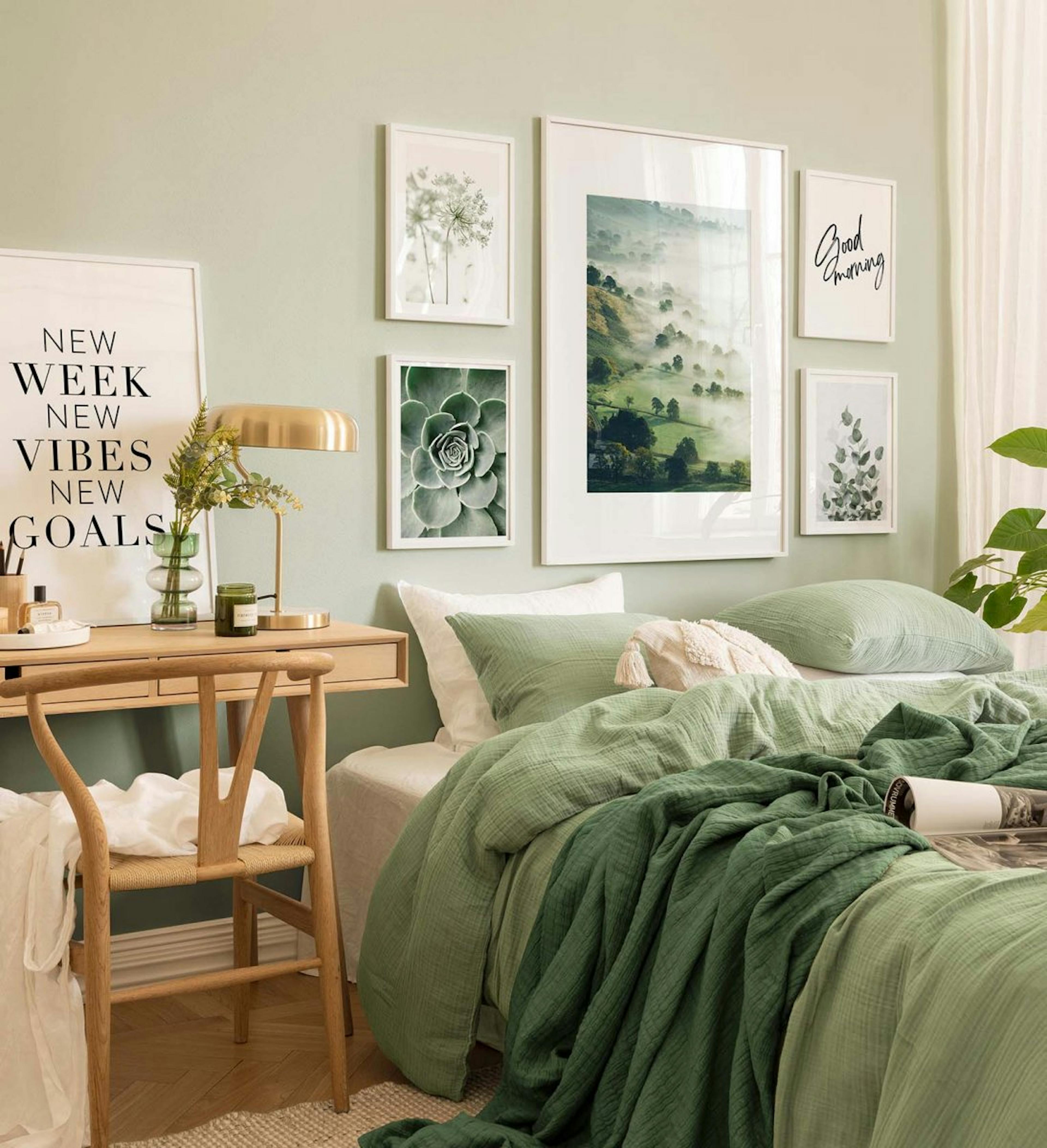 Green and soft gallery wall with white wood frames for bedroom