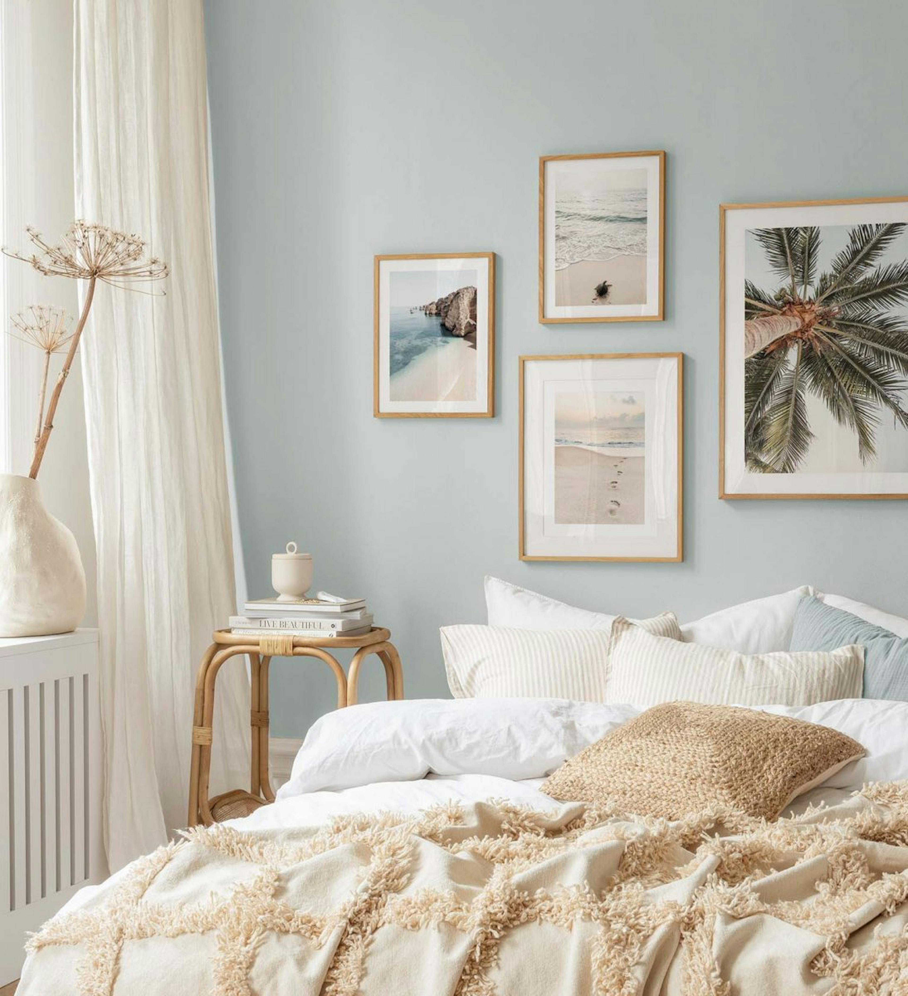 Tropical gallery wall with a summer vibe with oak frames for bedroom