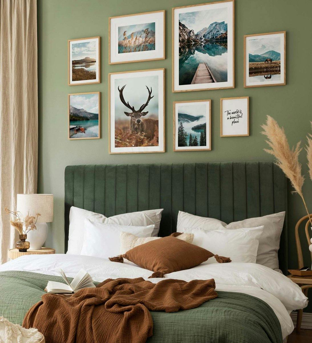 Animal and nature gallery wall in green colours with oak frames for bedroom